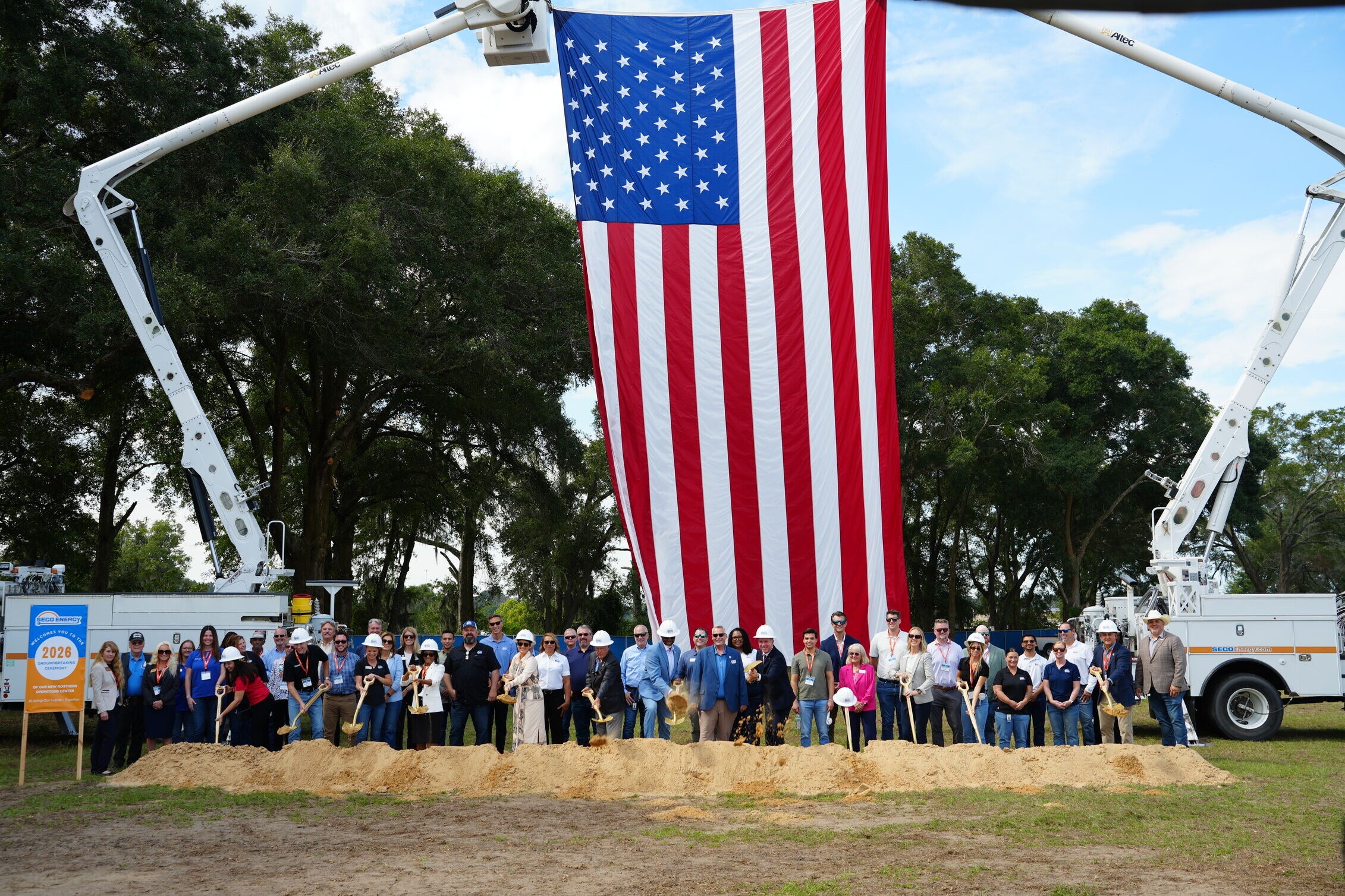 SECO Energy CEO Curtis Wynn, alongside the Board of Trustees, special speakers, and guests, at the shovel-turning moment during the groundbreaking ceremony.