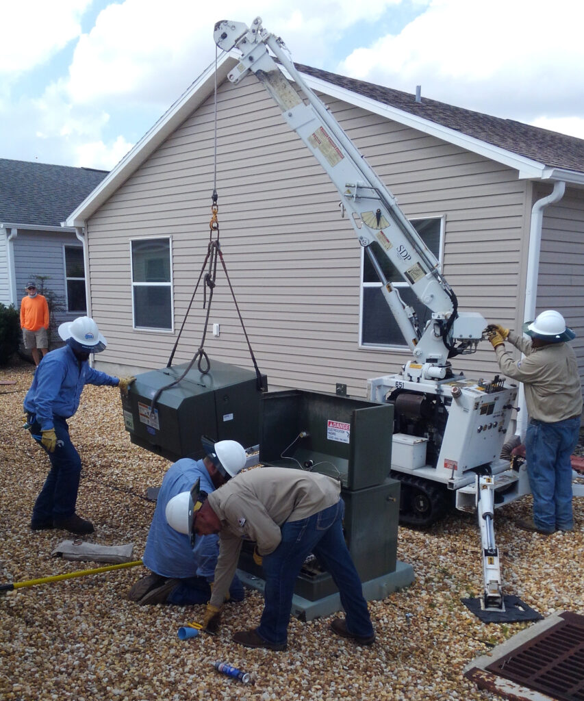Crews replacing a transformer near a home in The Villages.